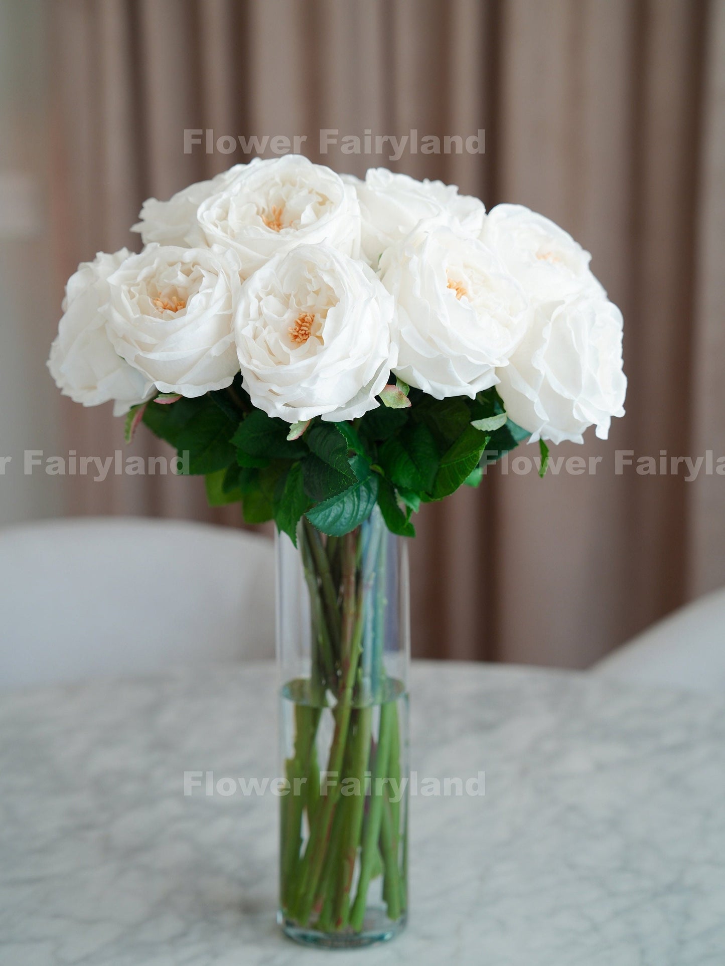 White real touch English roses arranged in vase