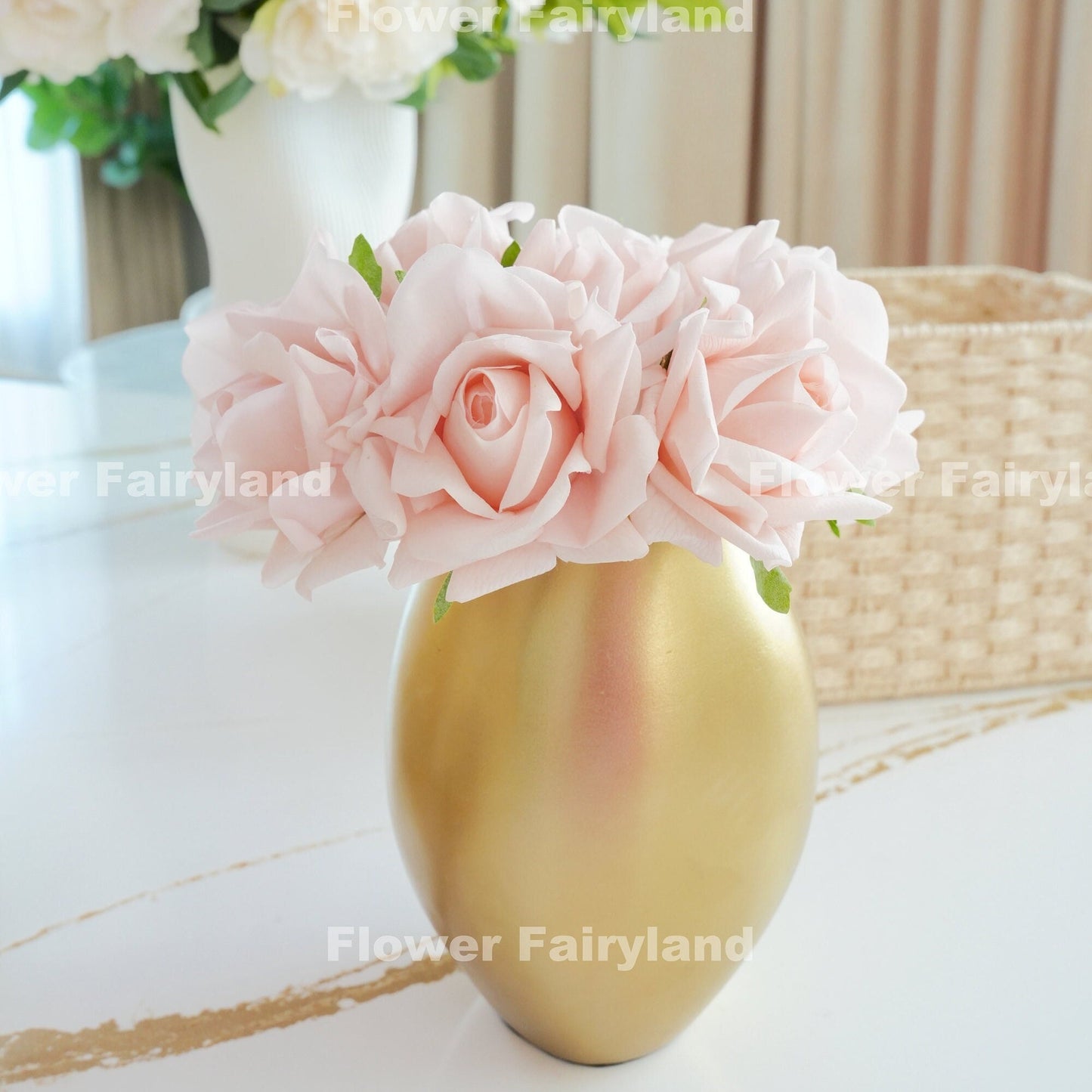 Pale pink rose bouquet in hand