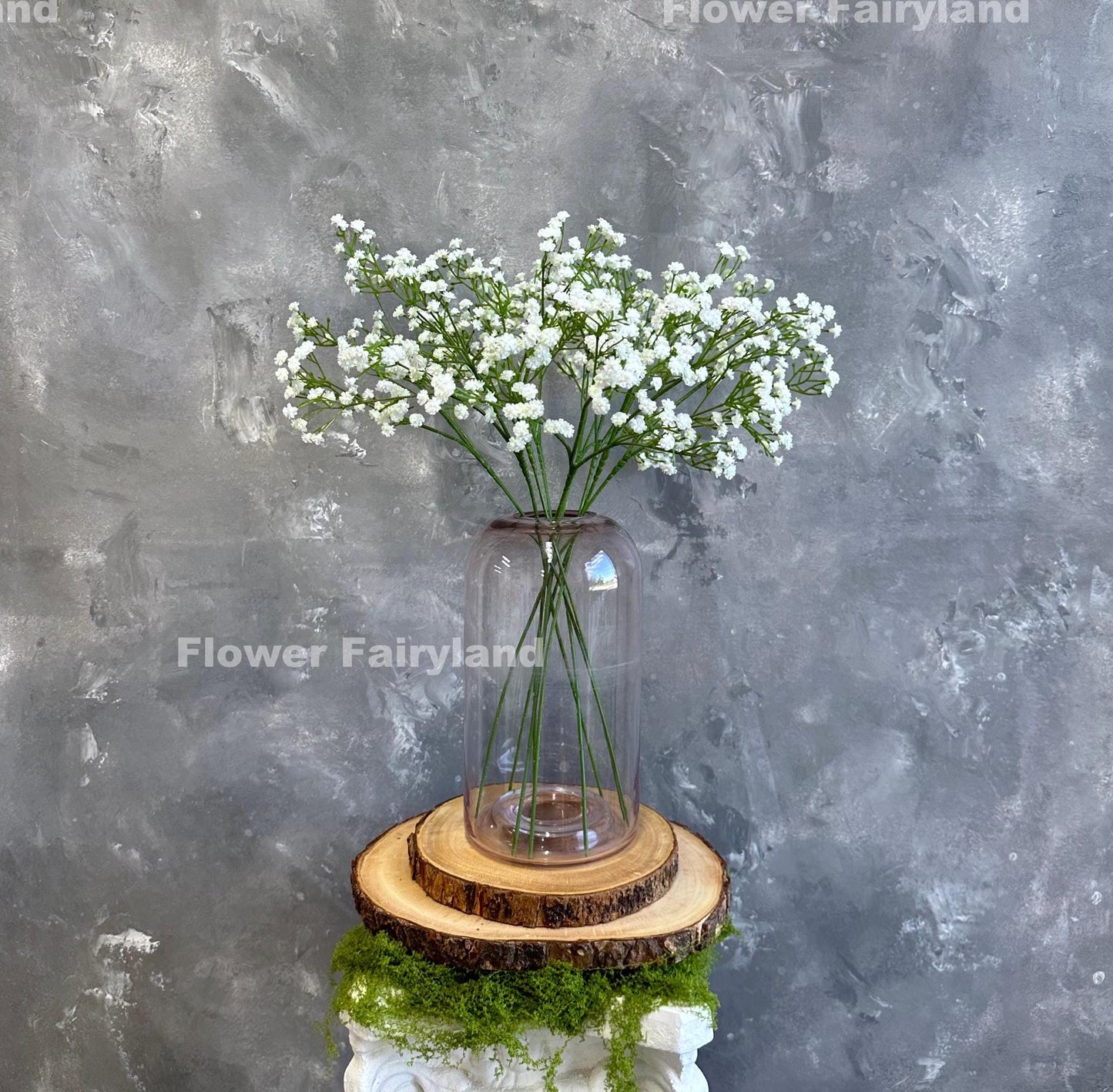 White faux baby's breath arrangement in a jar
