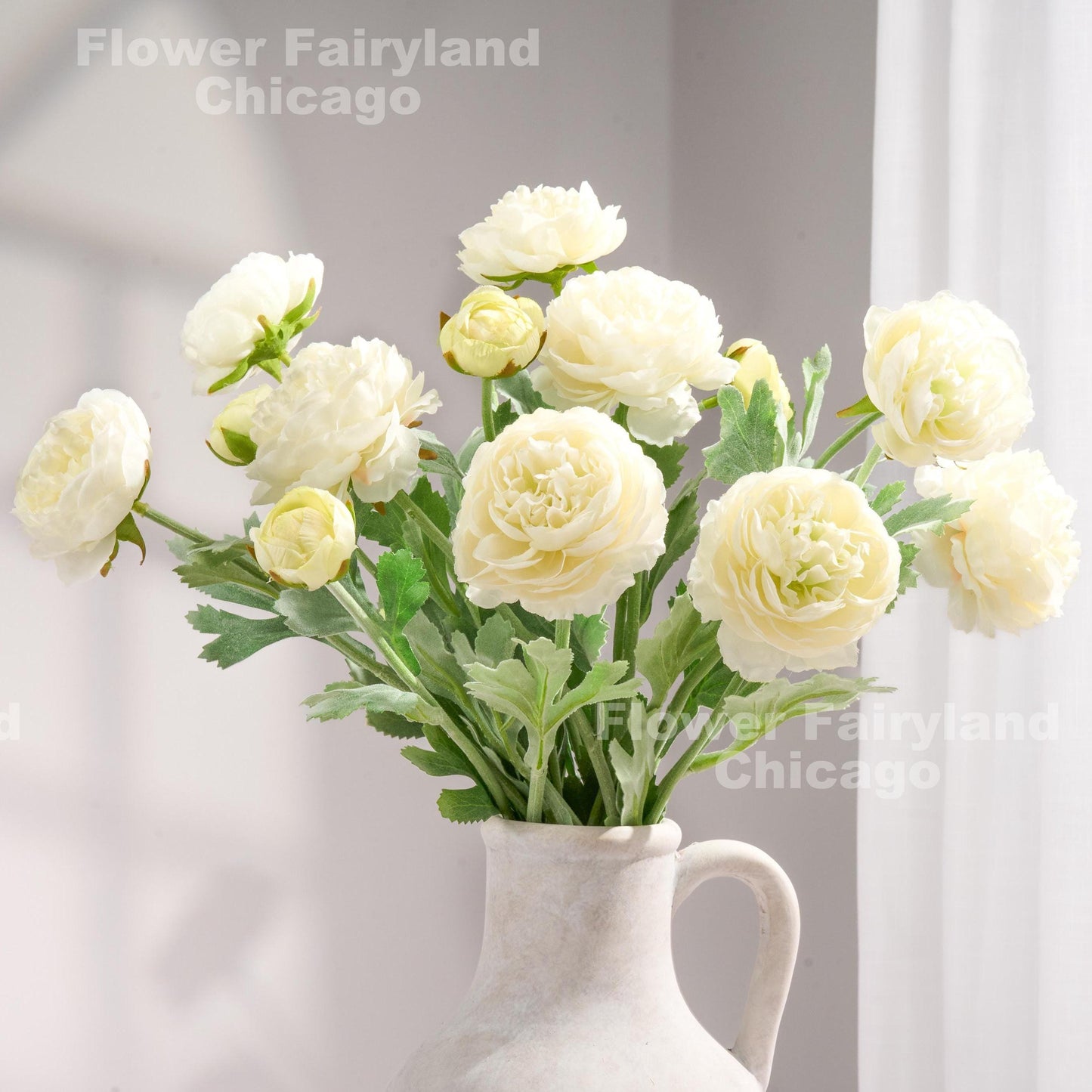 White 3 head faux ranunculus stems in vase