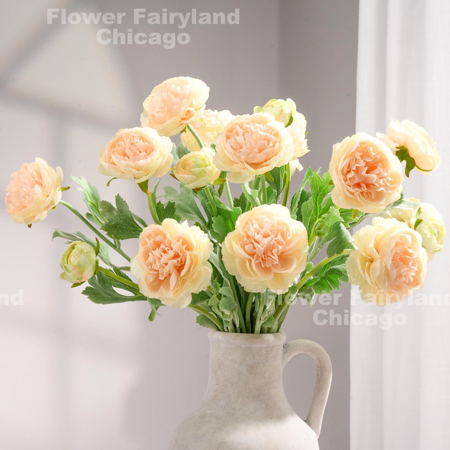 Gradient peach 3 head faux ranunculus stems in vase