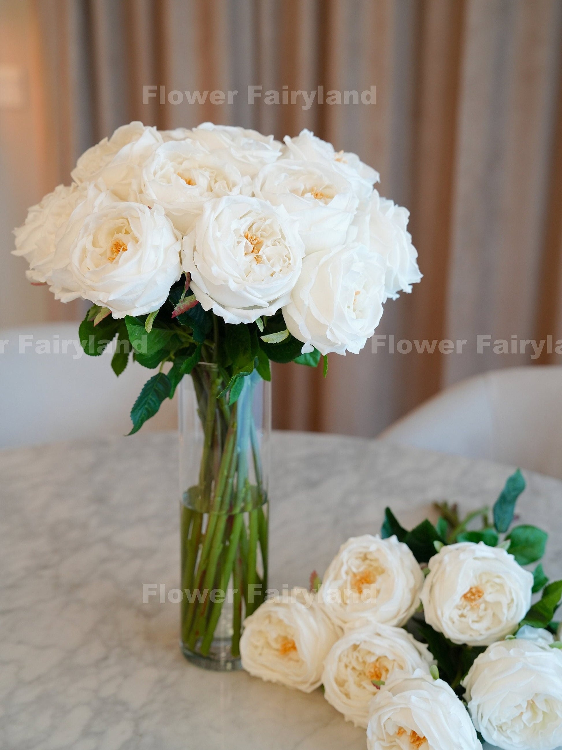 White David Austin rose bouquet in glass vase