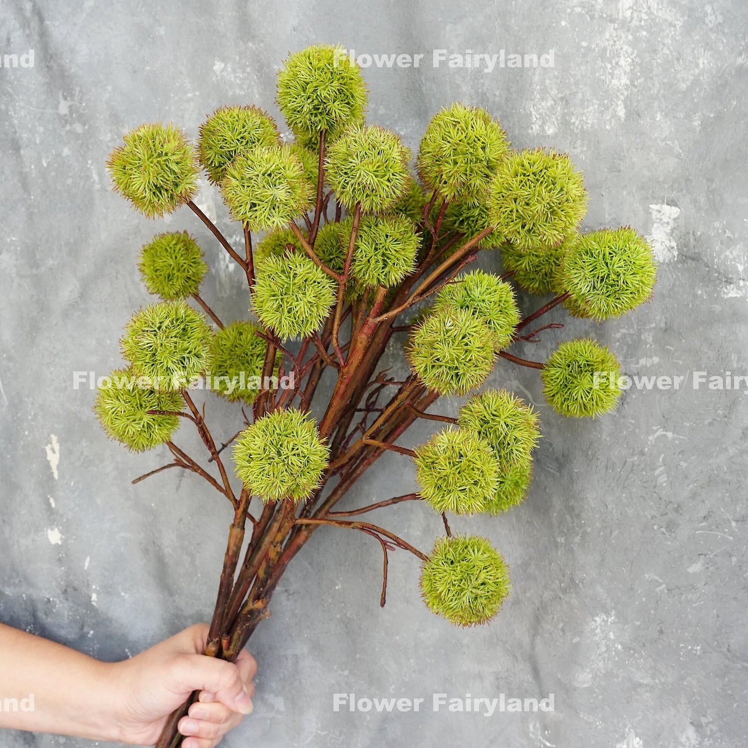 Faux chestnut branch styled in a vase