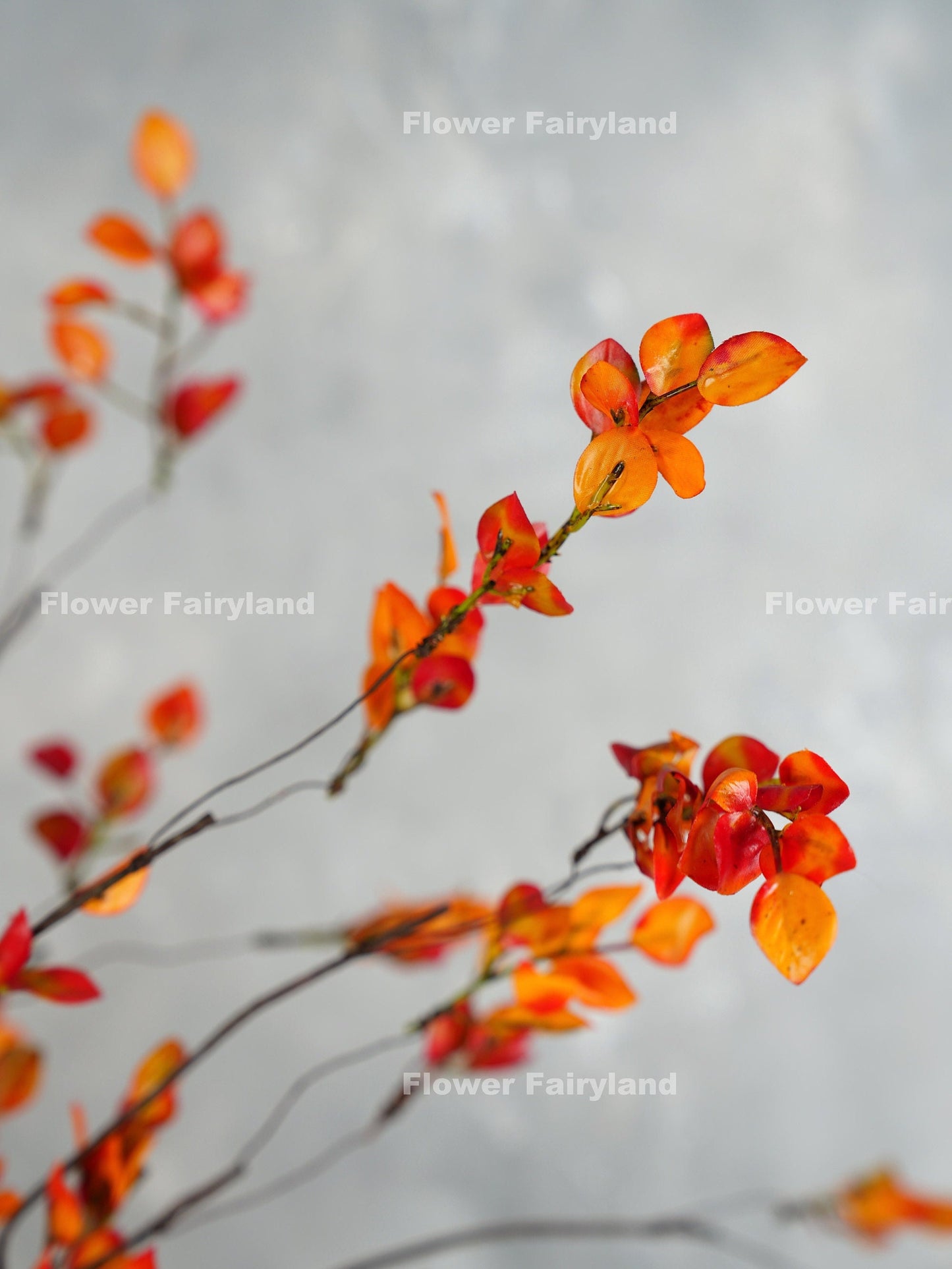 Orange faux leaves close-up