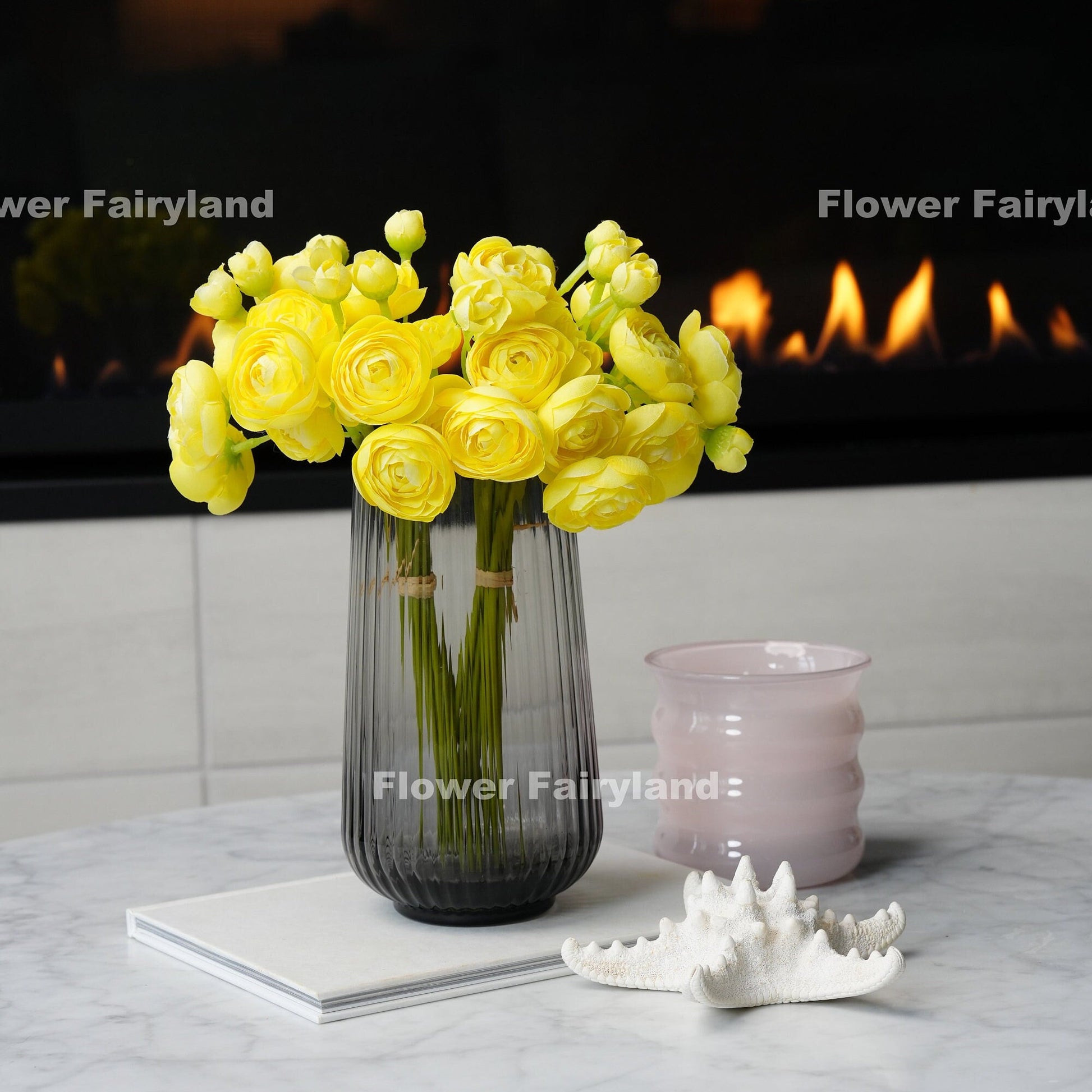 Yellow mini ranunculus bundle tied with raffia