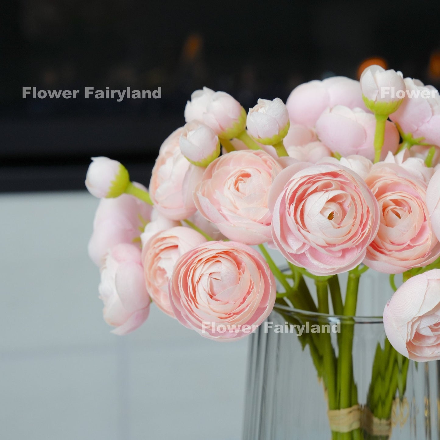 Soft pink mini ranunculus bundle tied with raffia