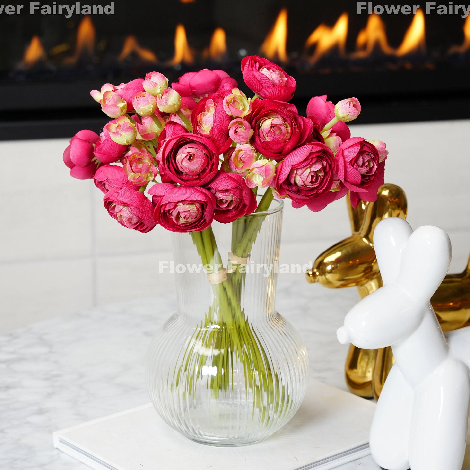 Magenta pink mini ranunculus bundle tied with raffia