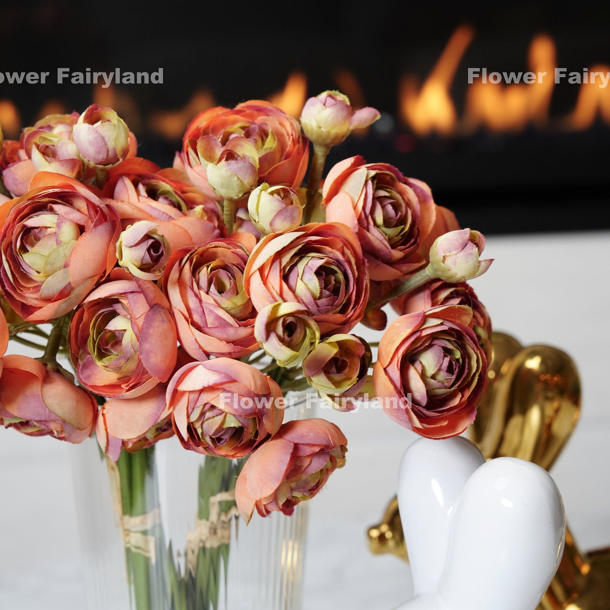 Pale burnt orange mini ranunculus bundle tied with raffia