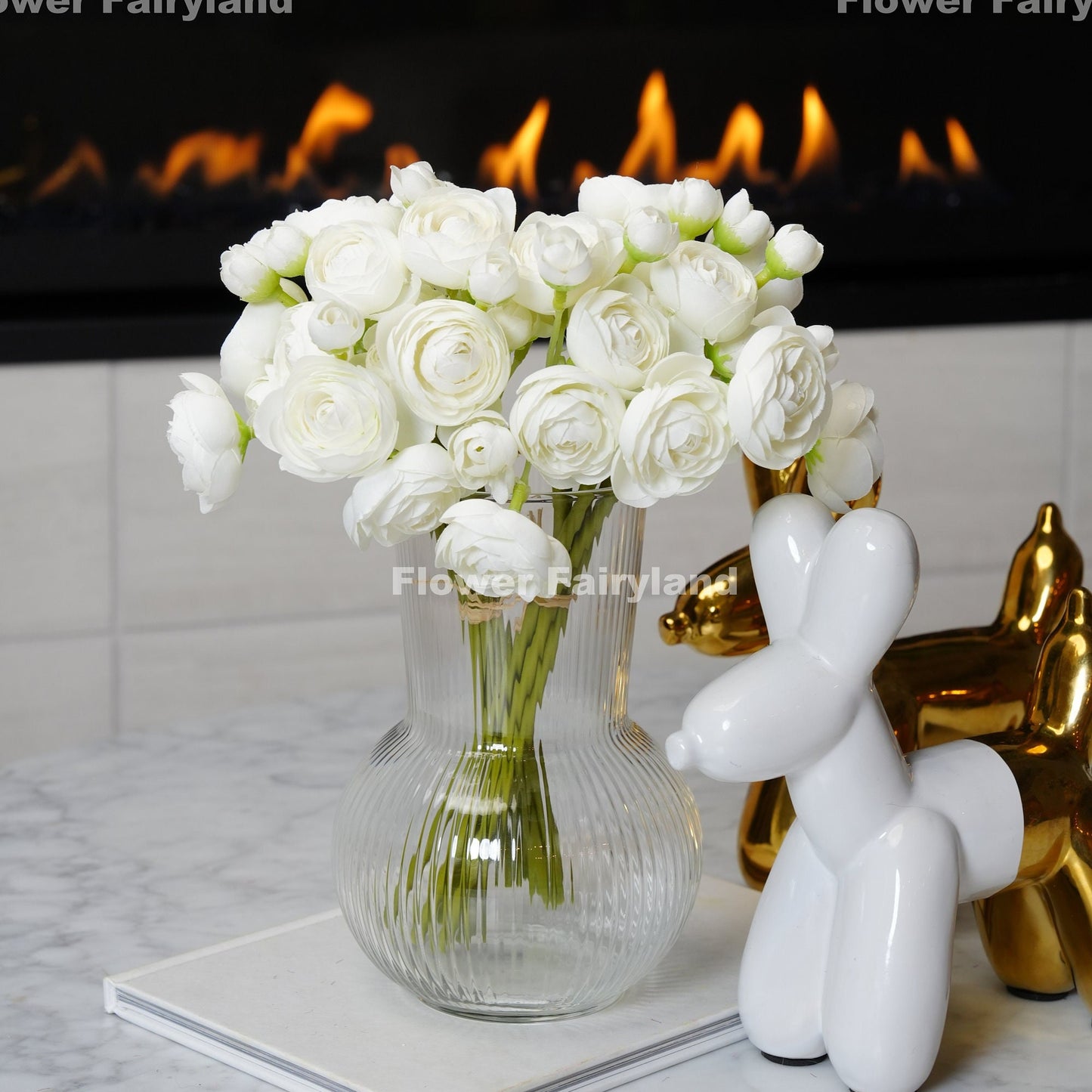 White mini ranunculus blooms close-up