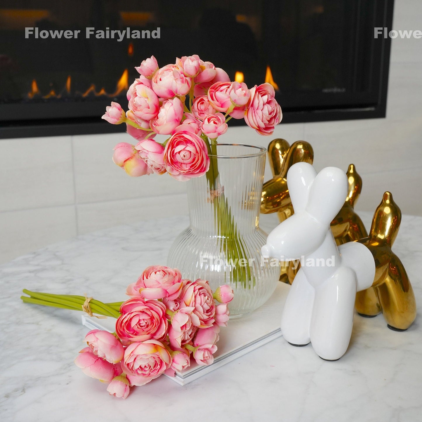 Flamingo pink mini ranunculus styled in a vase