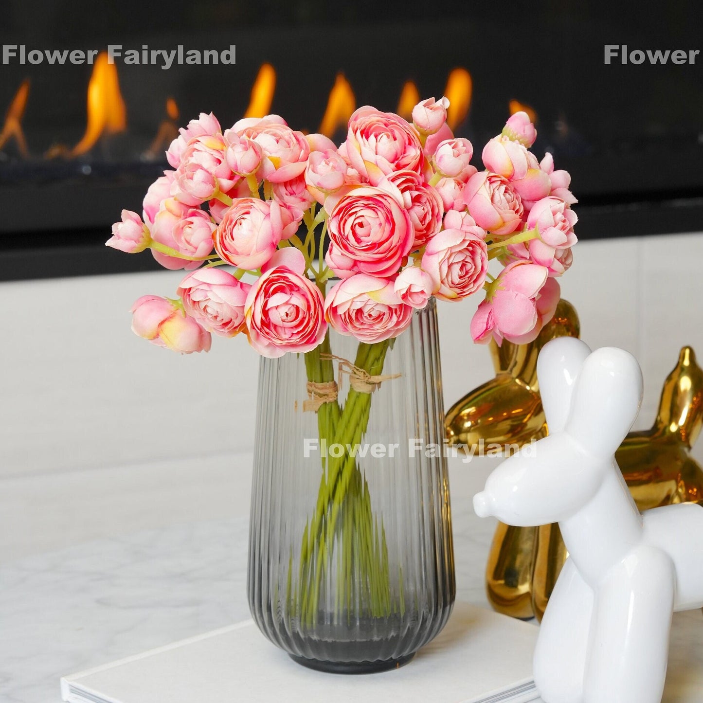 Flamingo pink mini ranunculus bundle tied with raffia