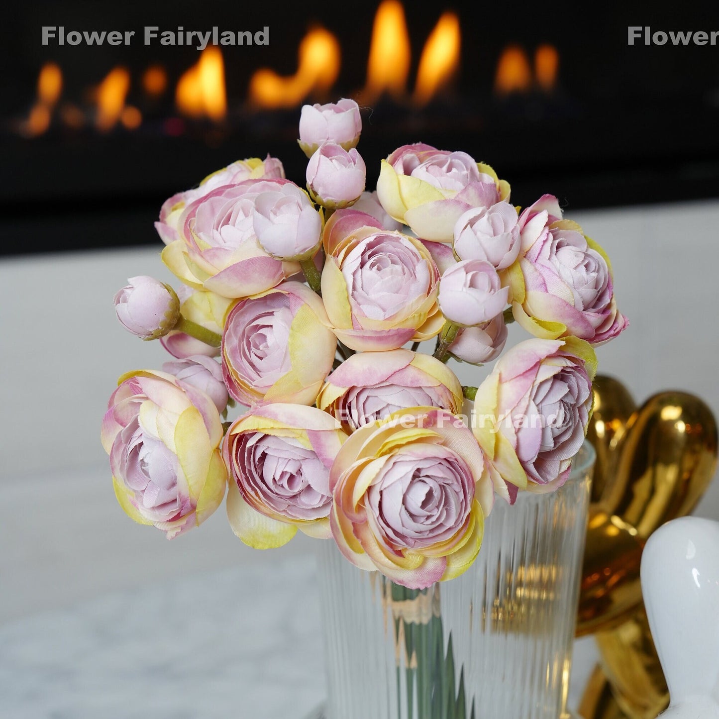Lilac lavender mini ranunculus styled in a vase