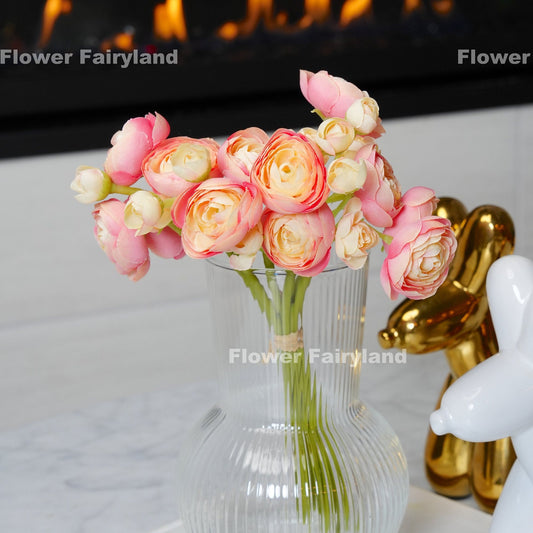 Pink peach mini ranunculus bundle tied with raffia