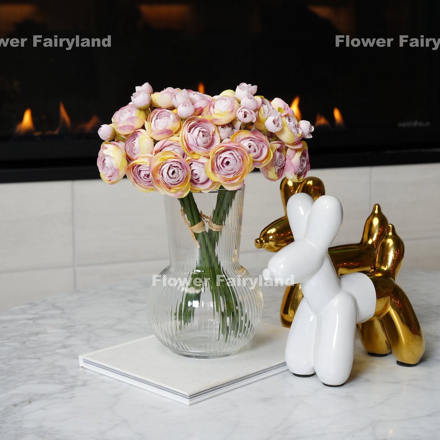 Lilac lavender ranunculus bundle held in hand