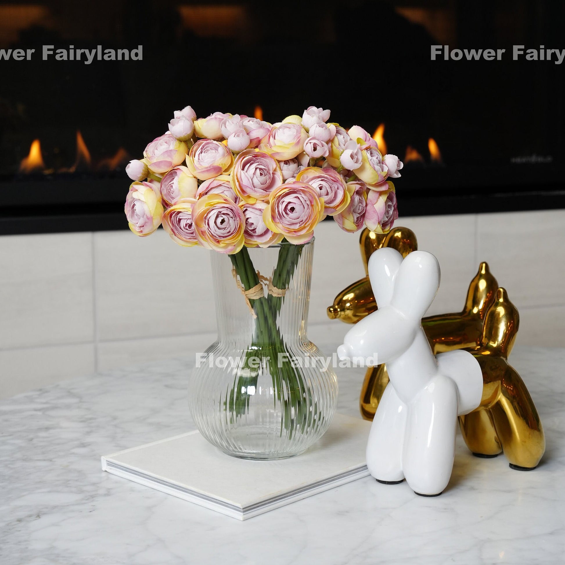 Lilac lavender ranunculus bundle held in hand