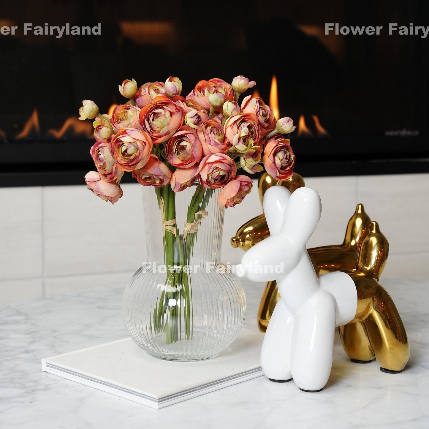 Pale burnt orange mini ranunculus in a vase