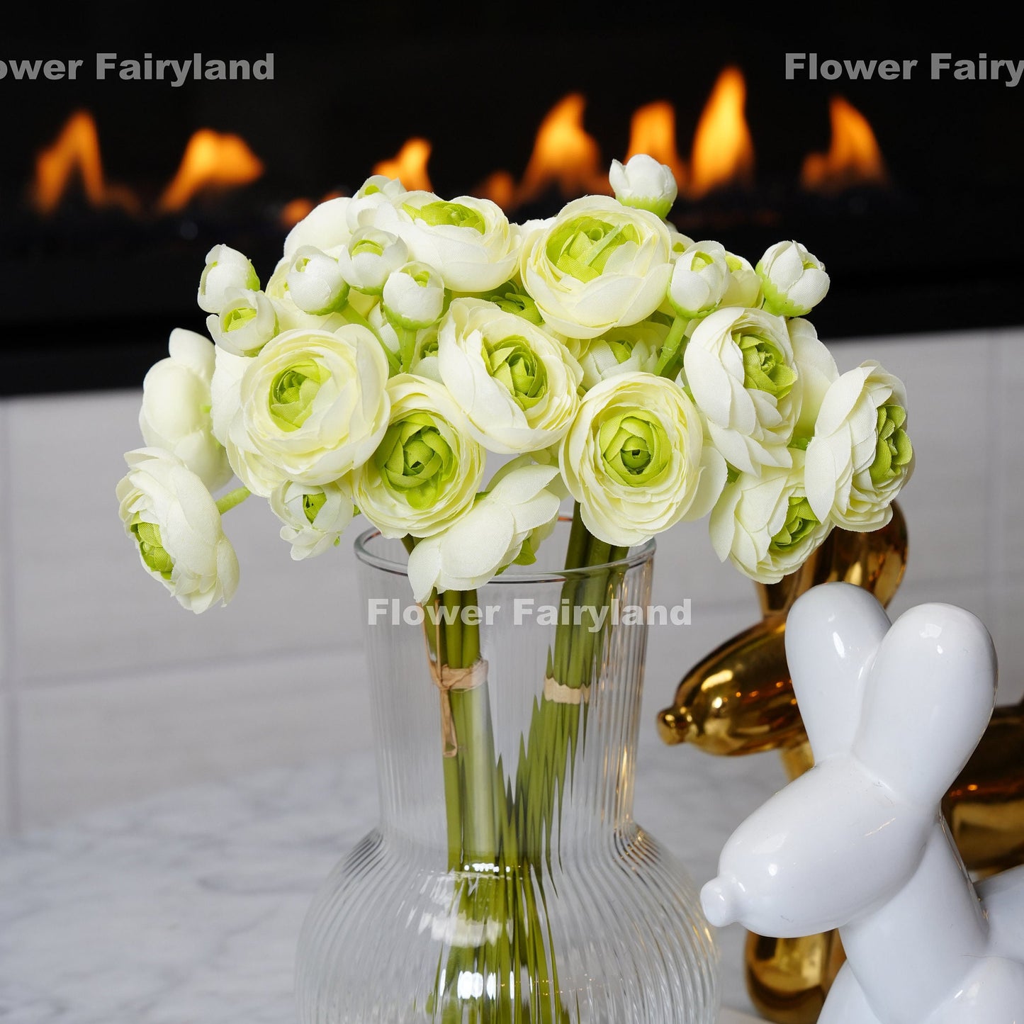 White and green mini ranunculus bundle tied with raffia
