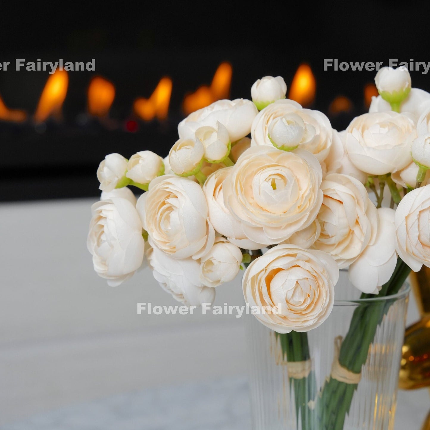 Champagne mini ranunculus styled in a vase