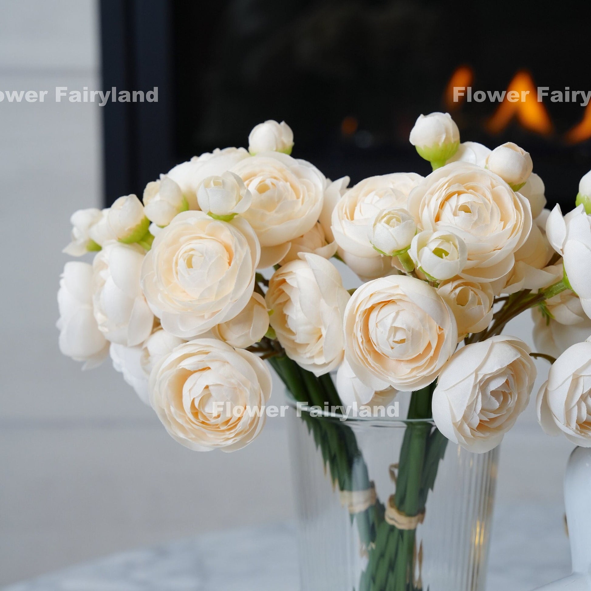 Champagne ranunculus bundle held in hand