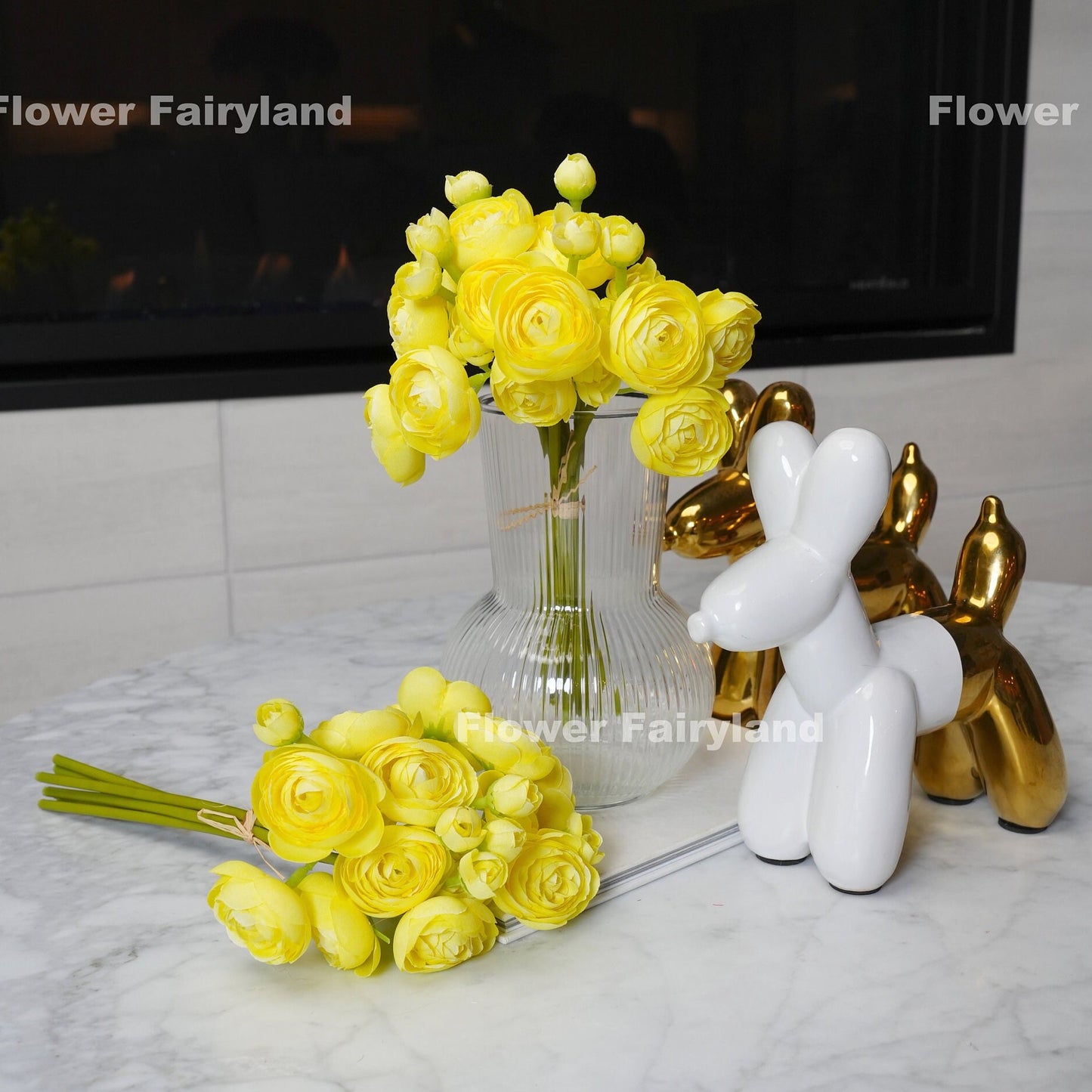 Yellow mini ranunculus styled in a vase