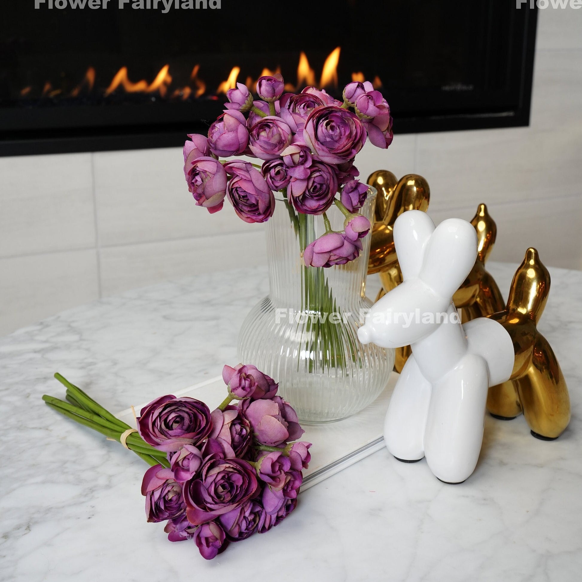 Vintage purple mini ranunculus styled in a vase