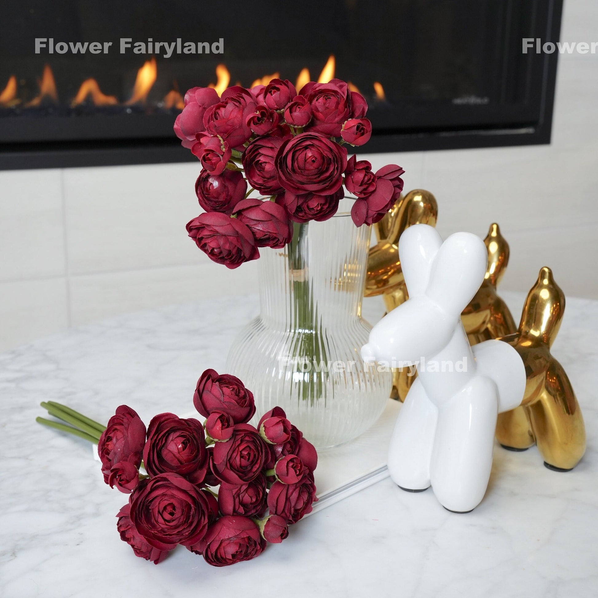 Burgundy mini ranunculus styled in a vase