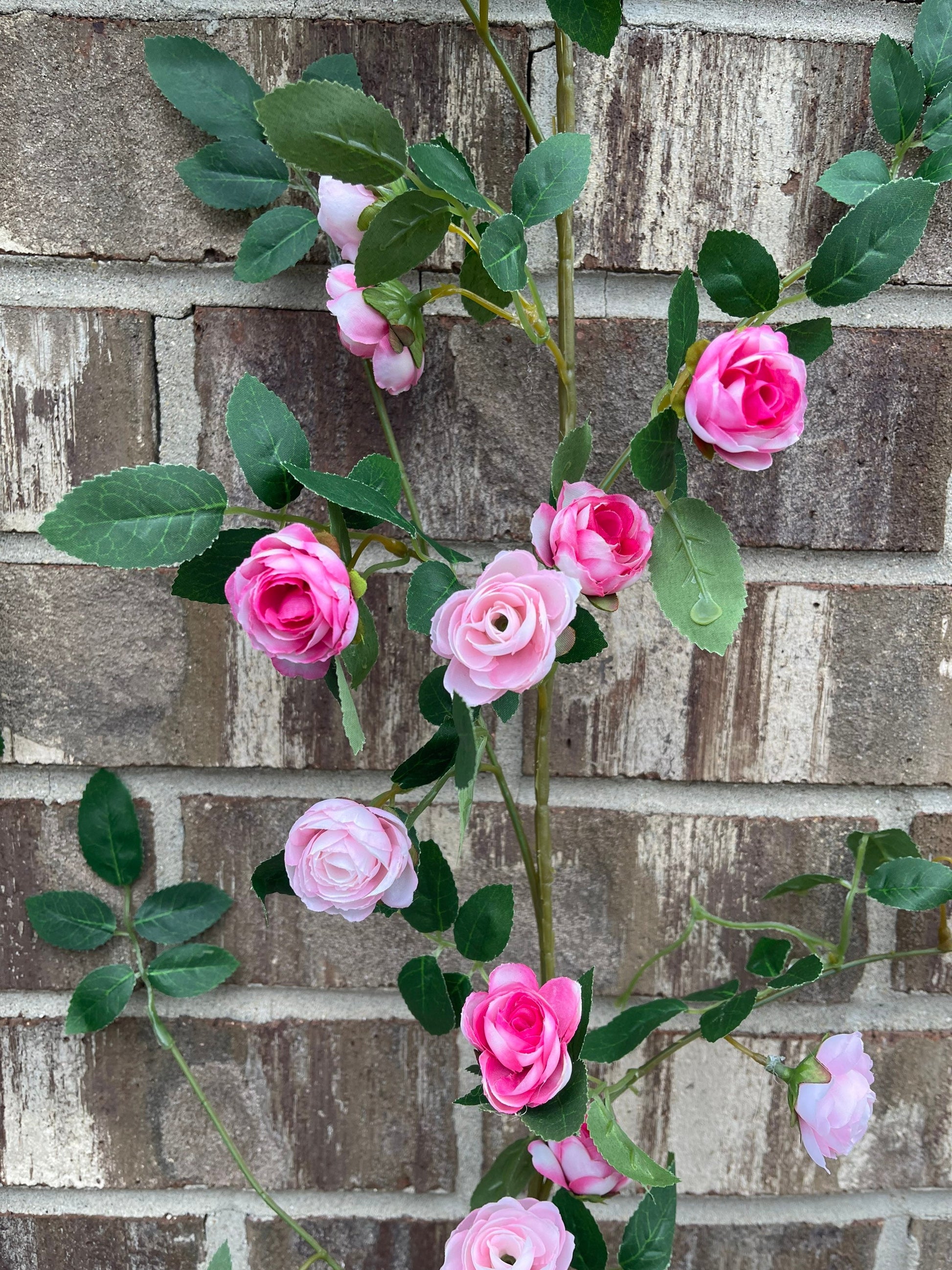 Pink rose garland draped in decor