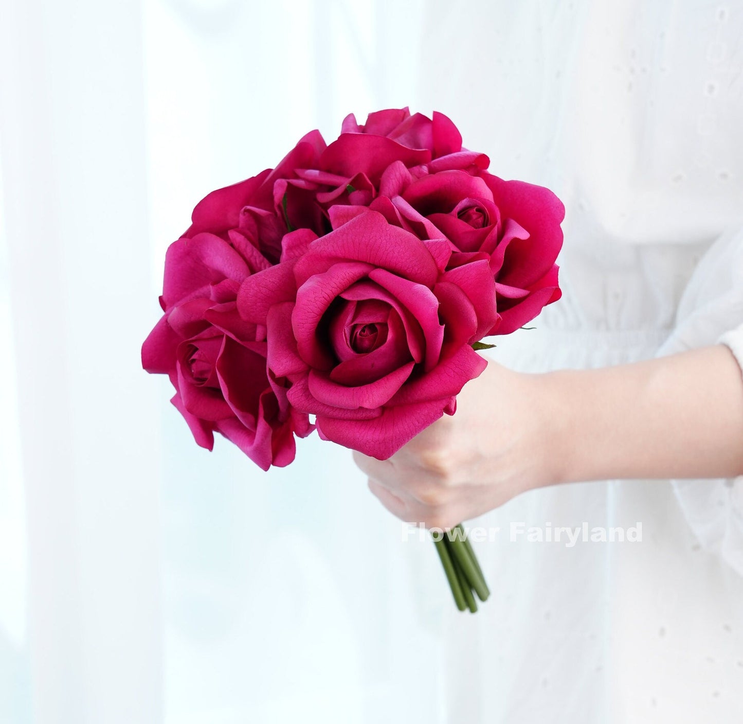 Deep magenta roses close-up