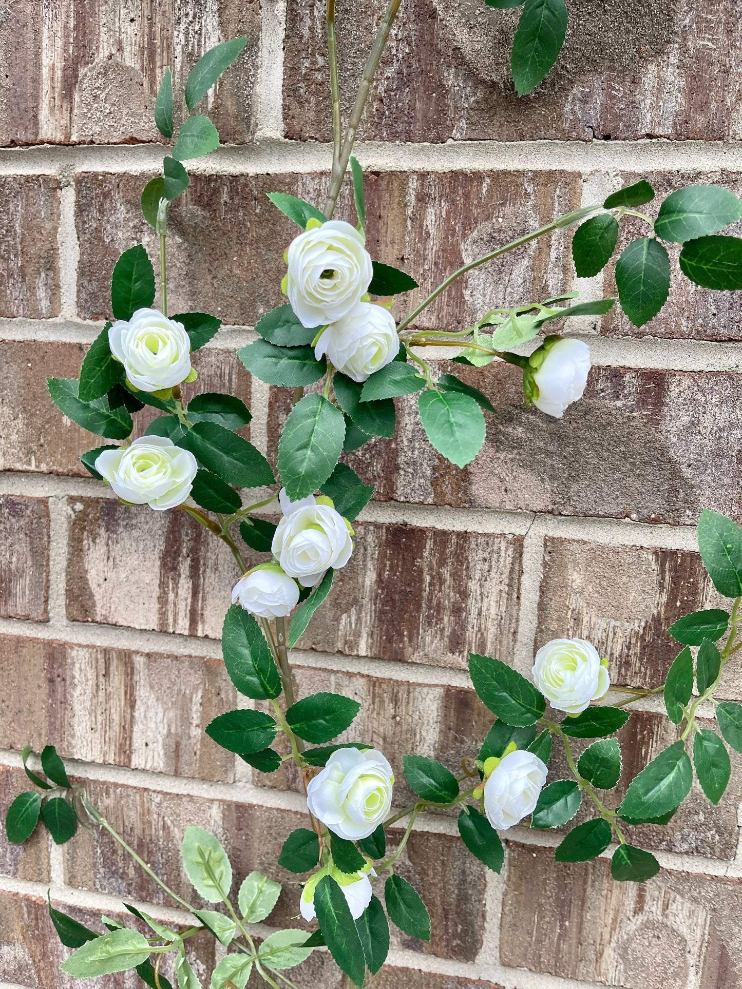 White rose garland draped in decor