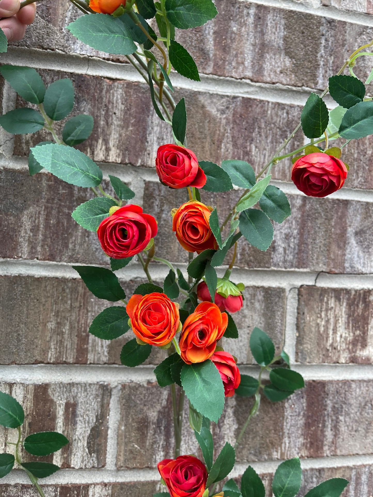 Red orange mini rose garland detail