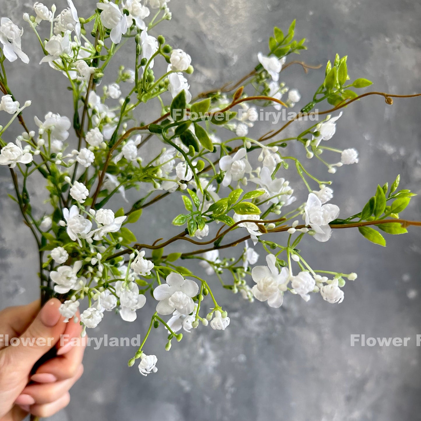 White faux wax flower branch detail