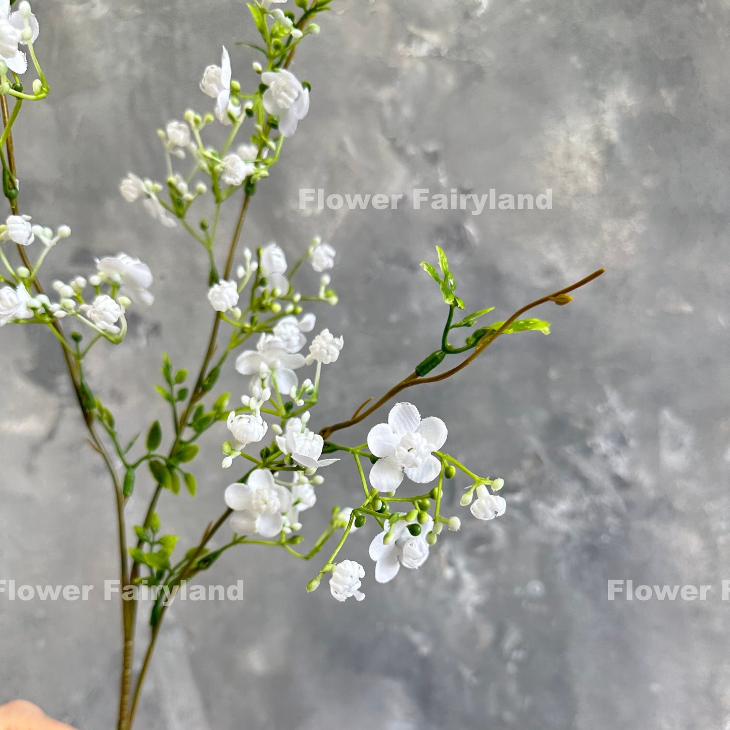 White faux wax flower blooms close-up