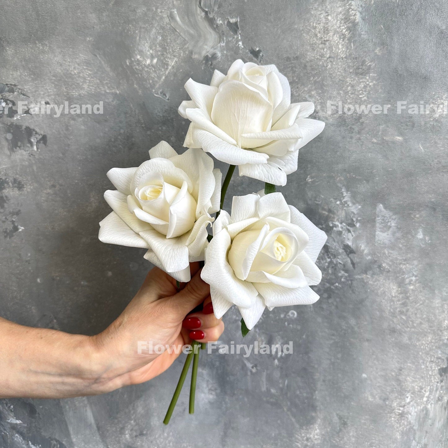 Milky white rose bouquet in hand
