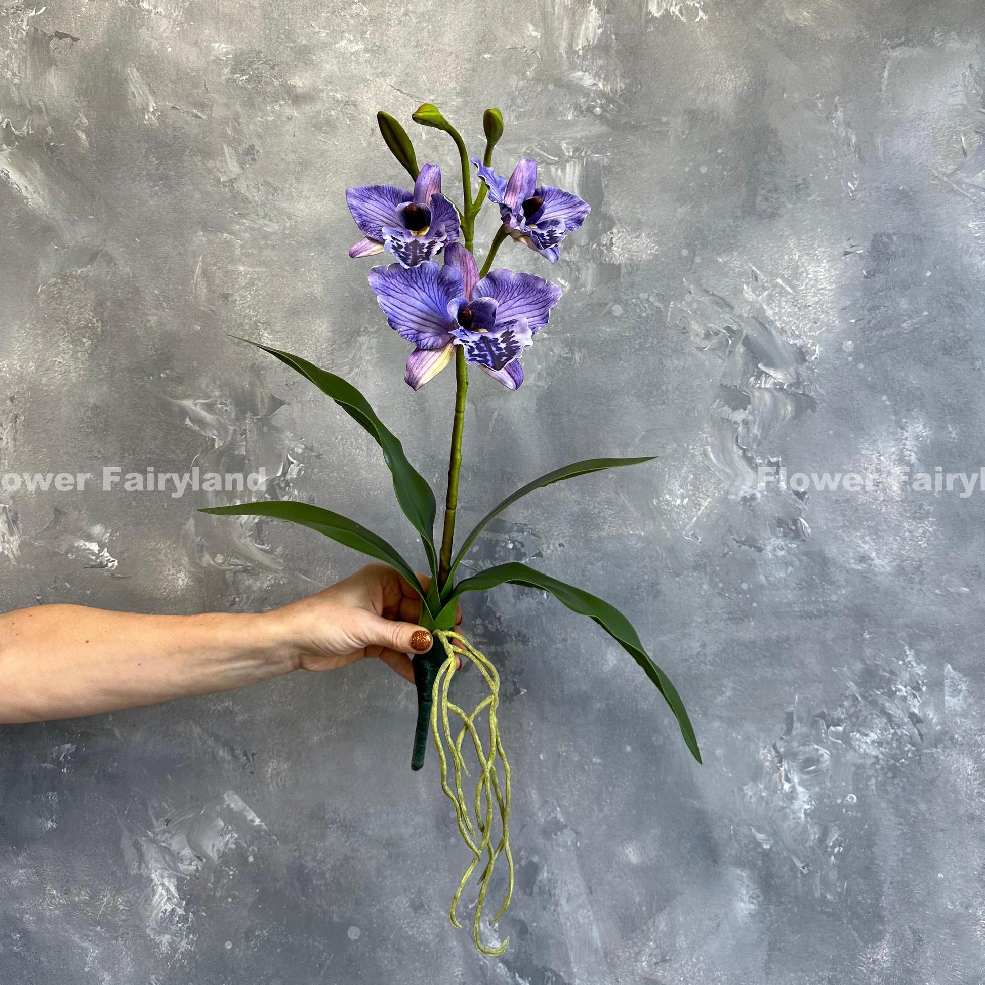 Purple faux cattleya orchid blooms