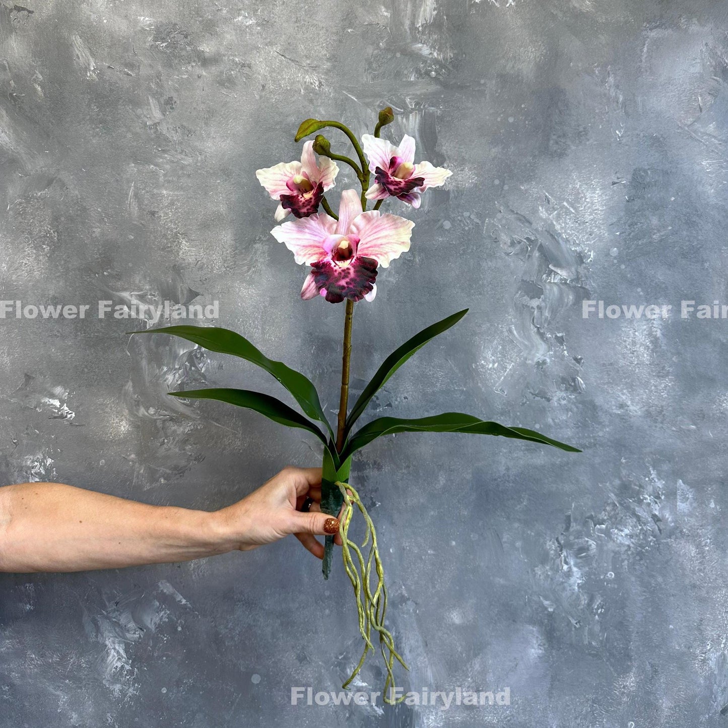 Pink faux cattleya orchid blooms