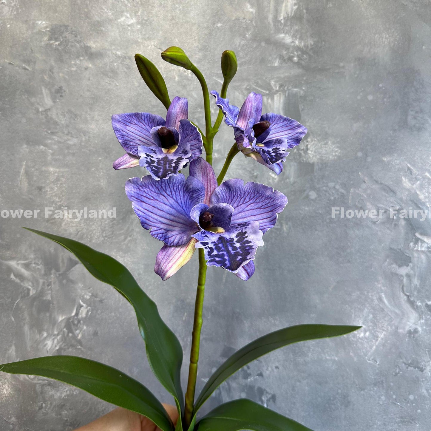 Purple faux cattleya orchid flower detail