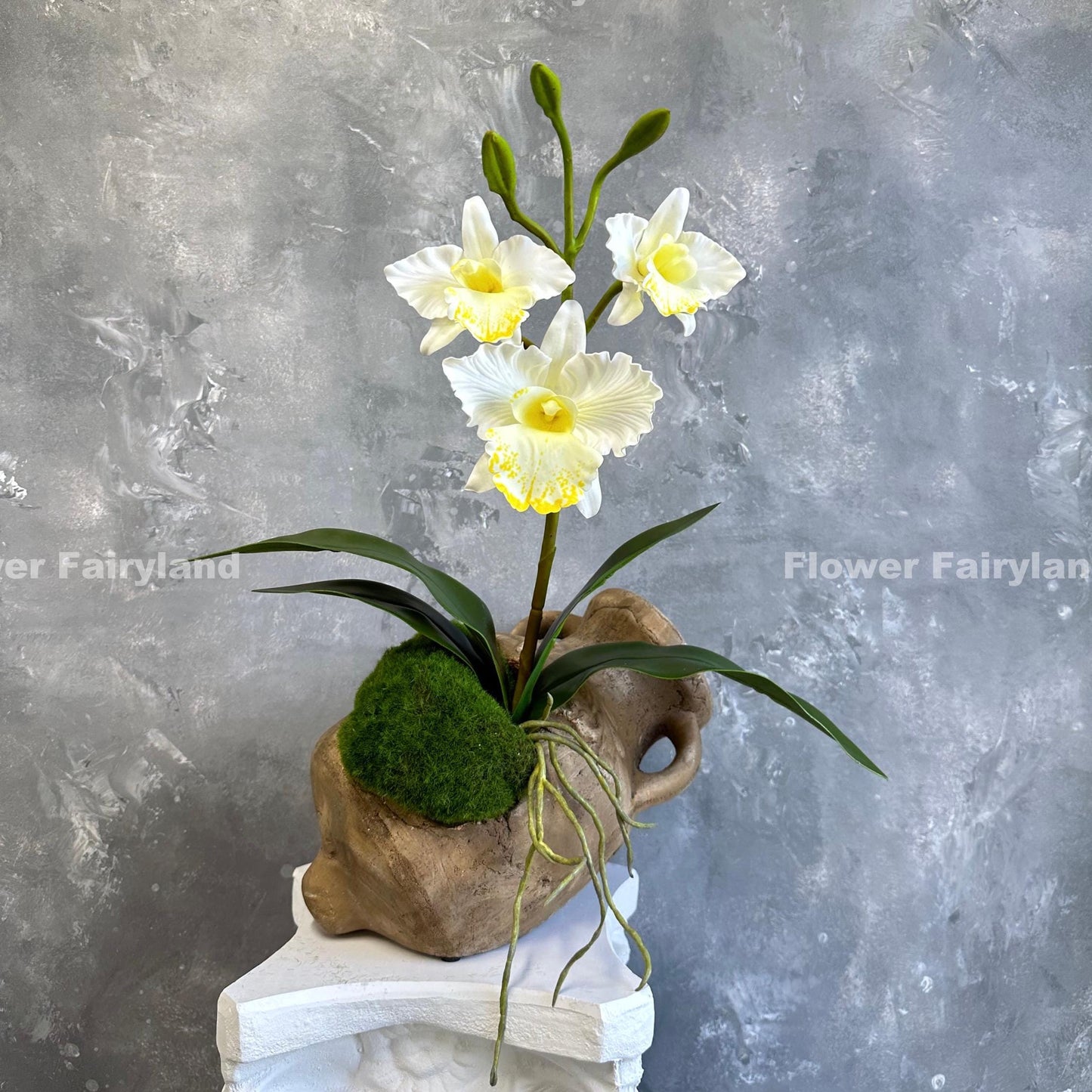 White faux cattleya orchid blooms