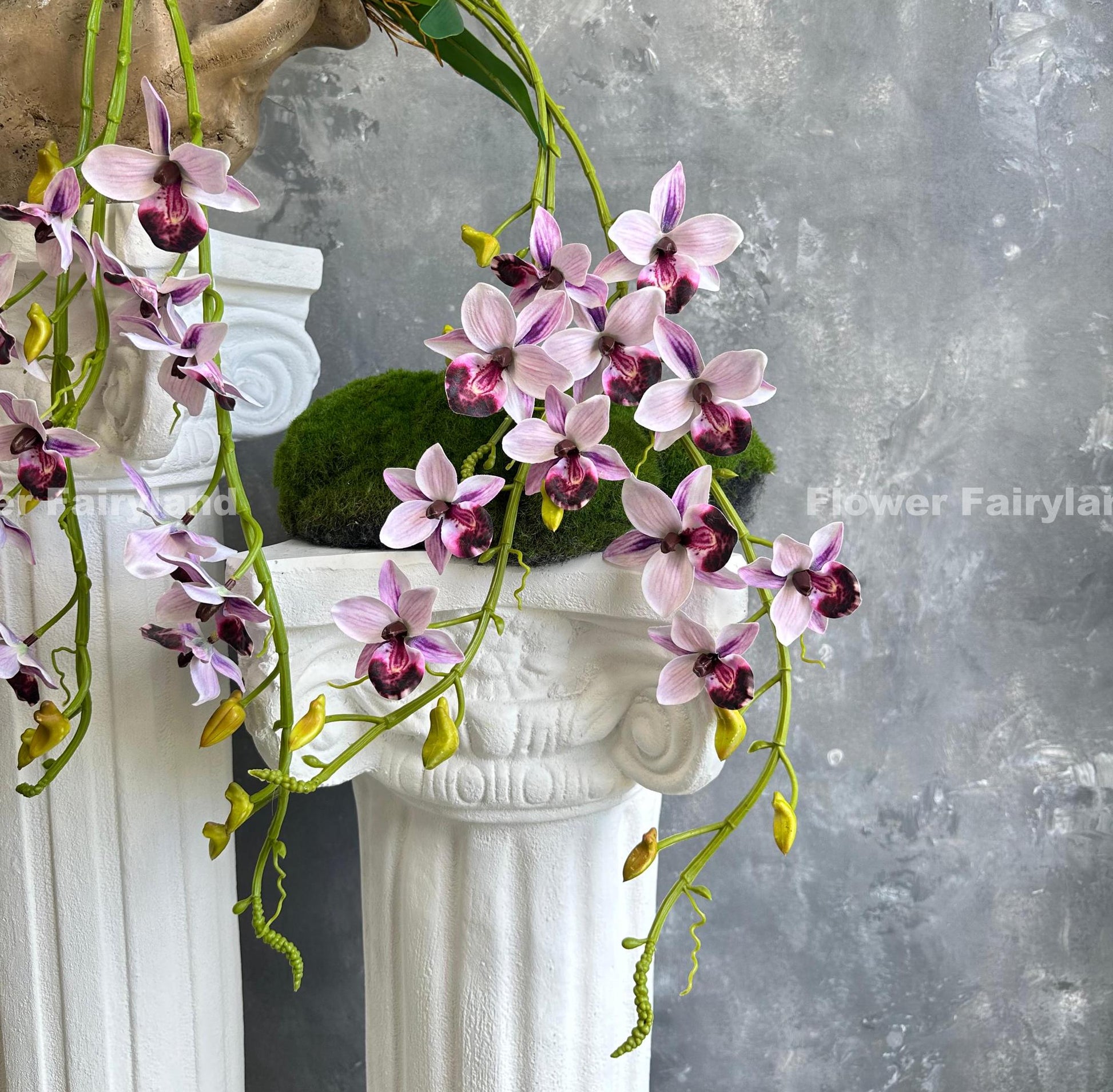 Purplish pink faux hanging Rodriguezia orchid