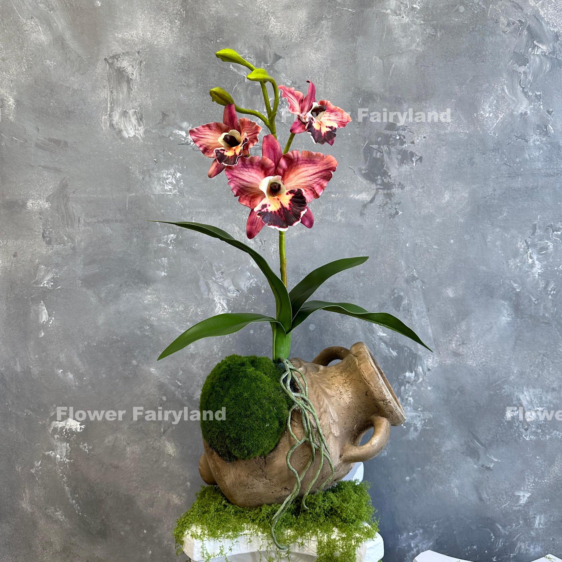 Light coral burgundy faux cattleya orchid full view