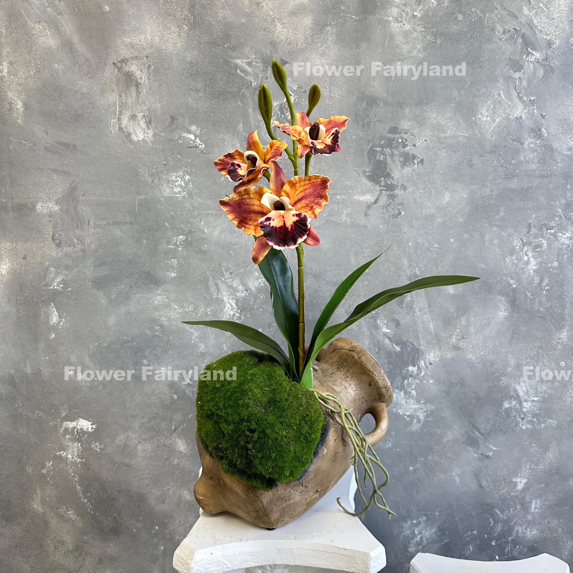 Dark reddish orange faux cattleya orchid blooms