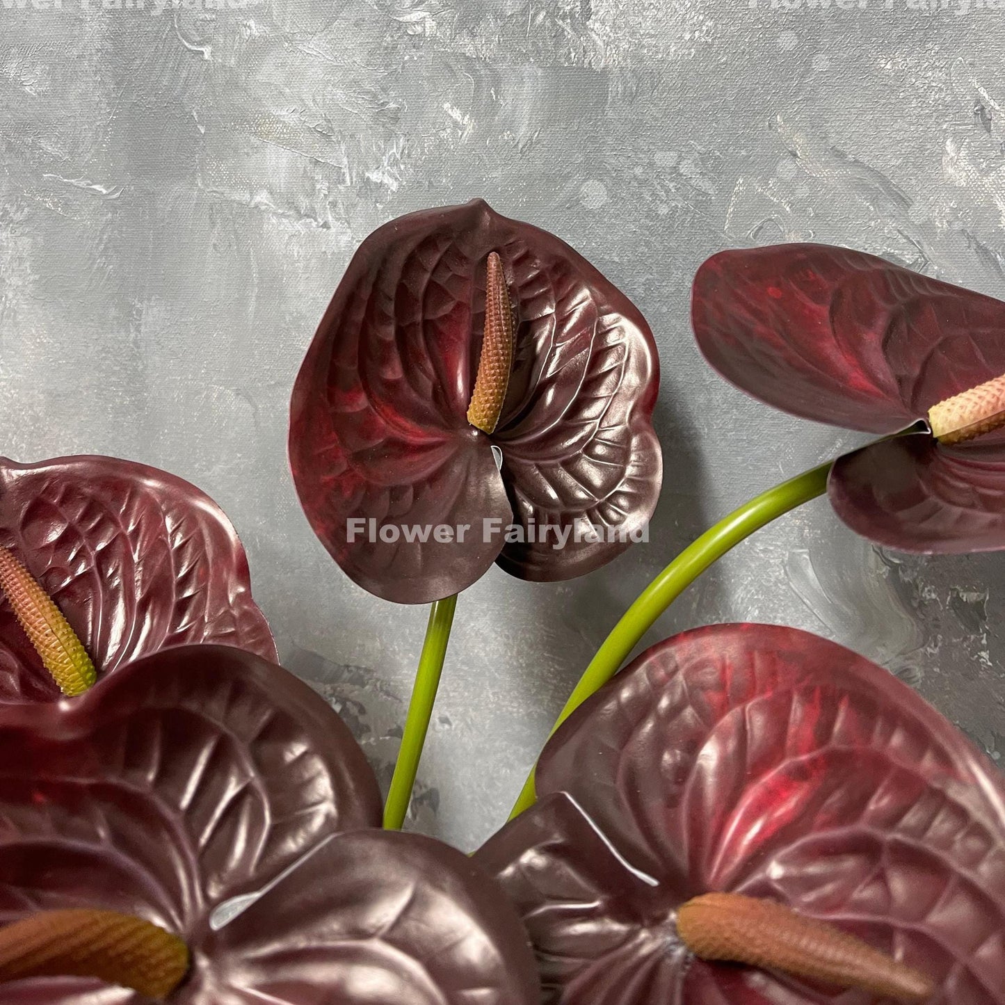 Real touch anthurium stem in burgundy - flower head close-up