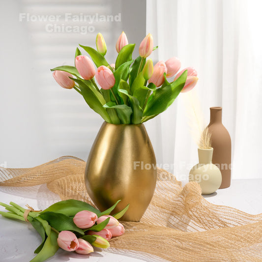 Light pink tulips styled in a vase