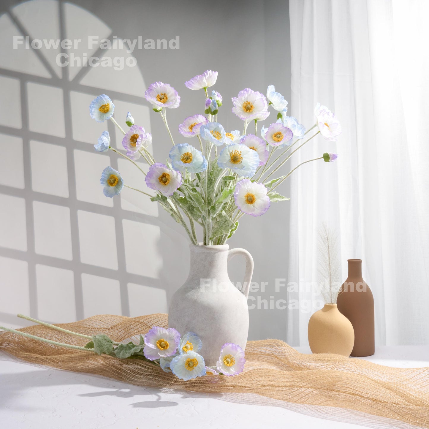 Ice blue poppy arrangement