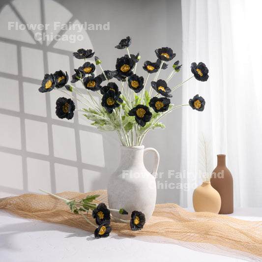 Black poppies in a vase