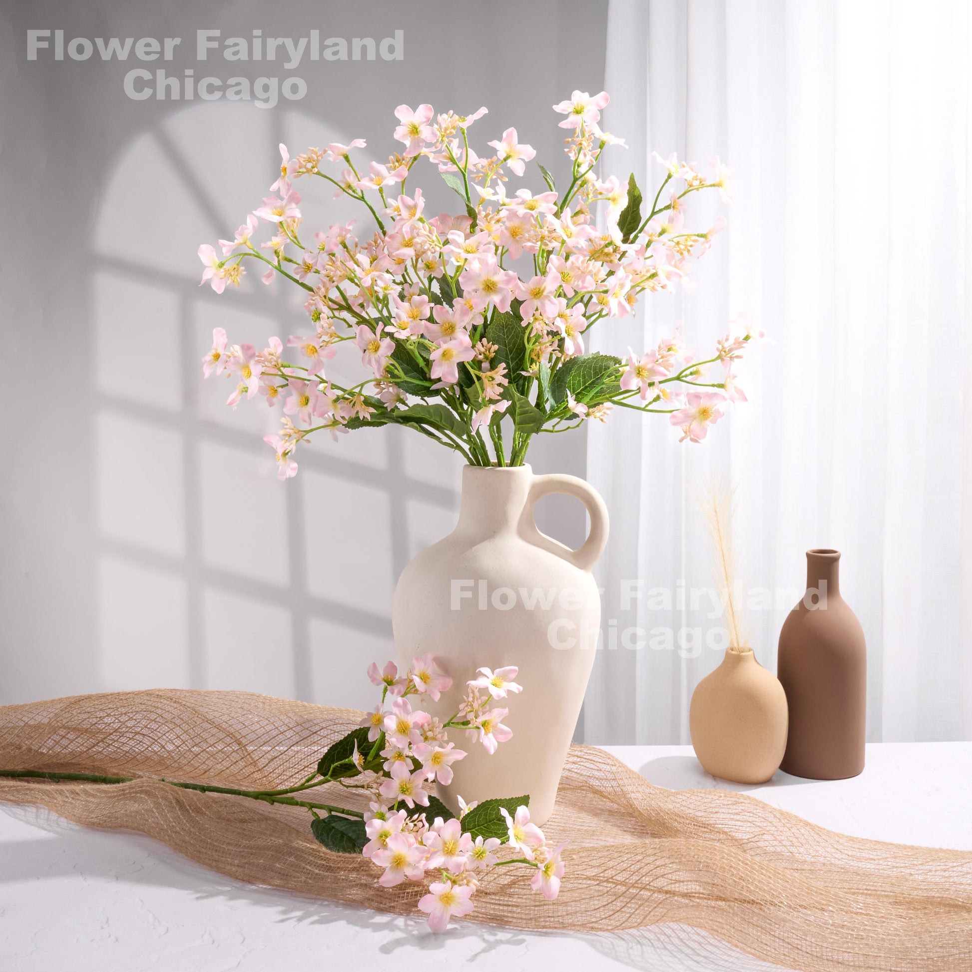 Light pink faux Vernicia flower arrangement
