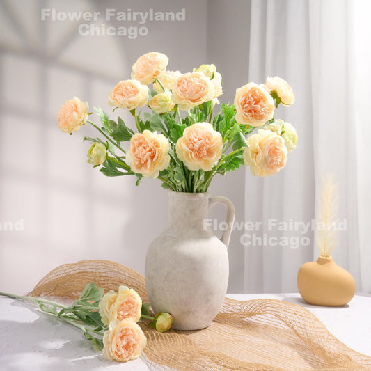 Gradient peach ranunculus arrangement
