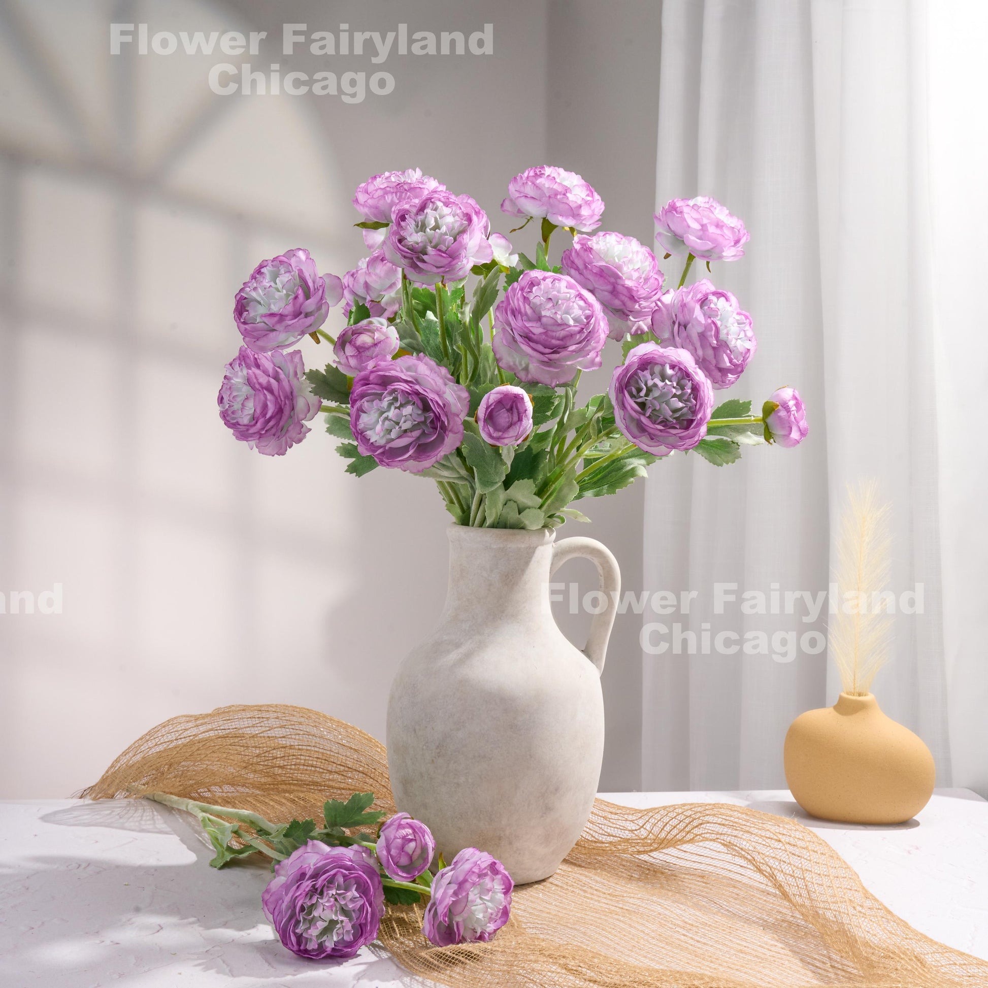 Bicolor purple ranunculus arrangement