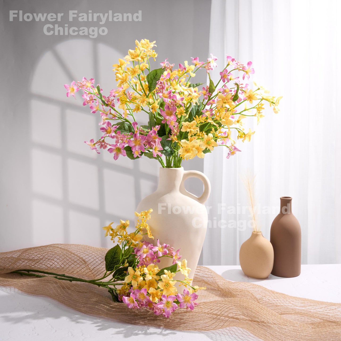 Yellow faux Vernicia flower arrangement