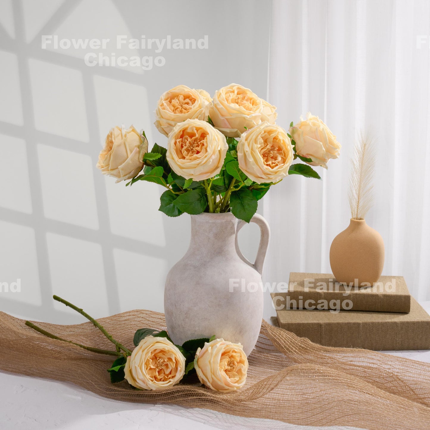 Light peach English roses in a vase