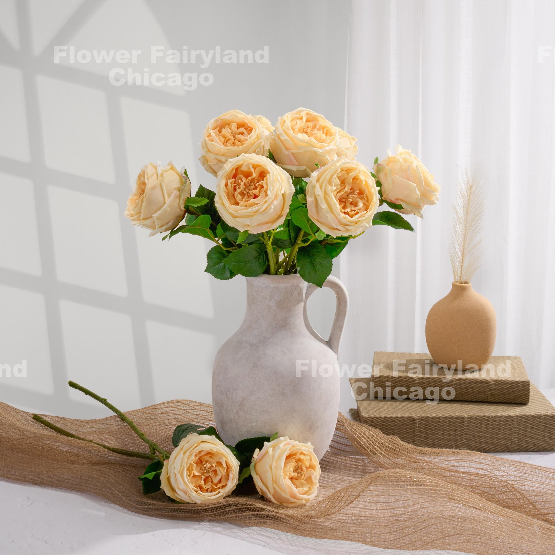 Light peach English roses in a vase